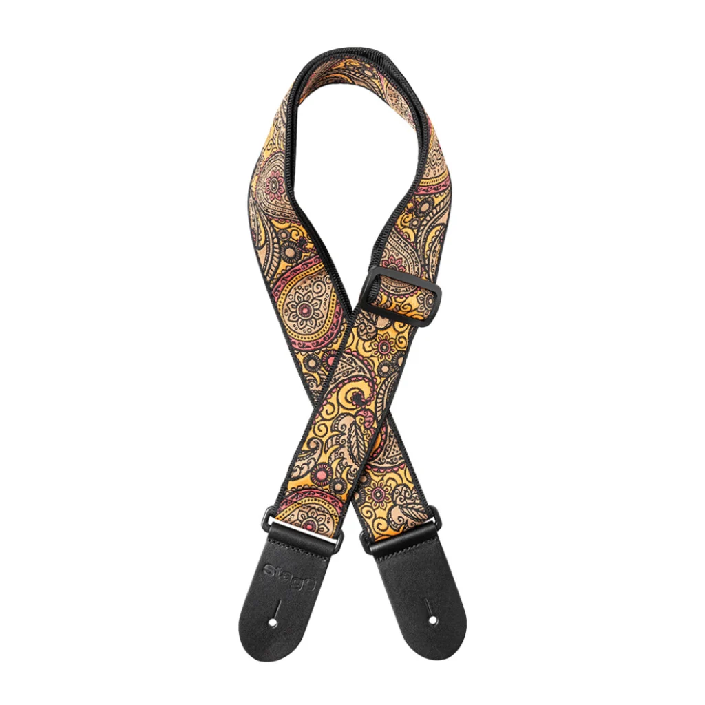 Correa textil Stagg SWO-PSLY 1 ORA con estampado clásico paisley naranja y terminales de cuero negro para guitarra o bajo.