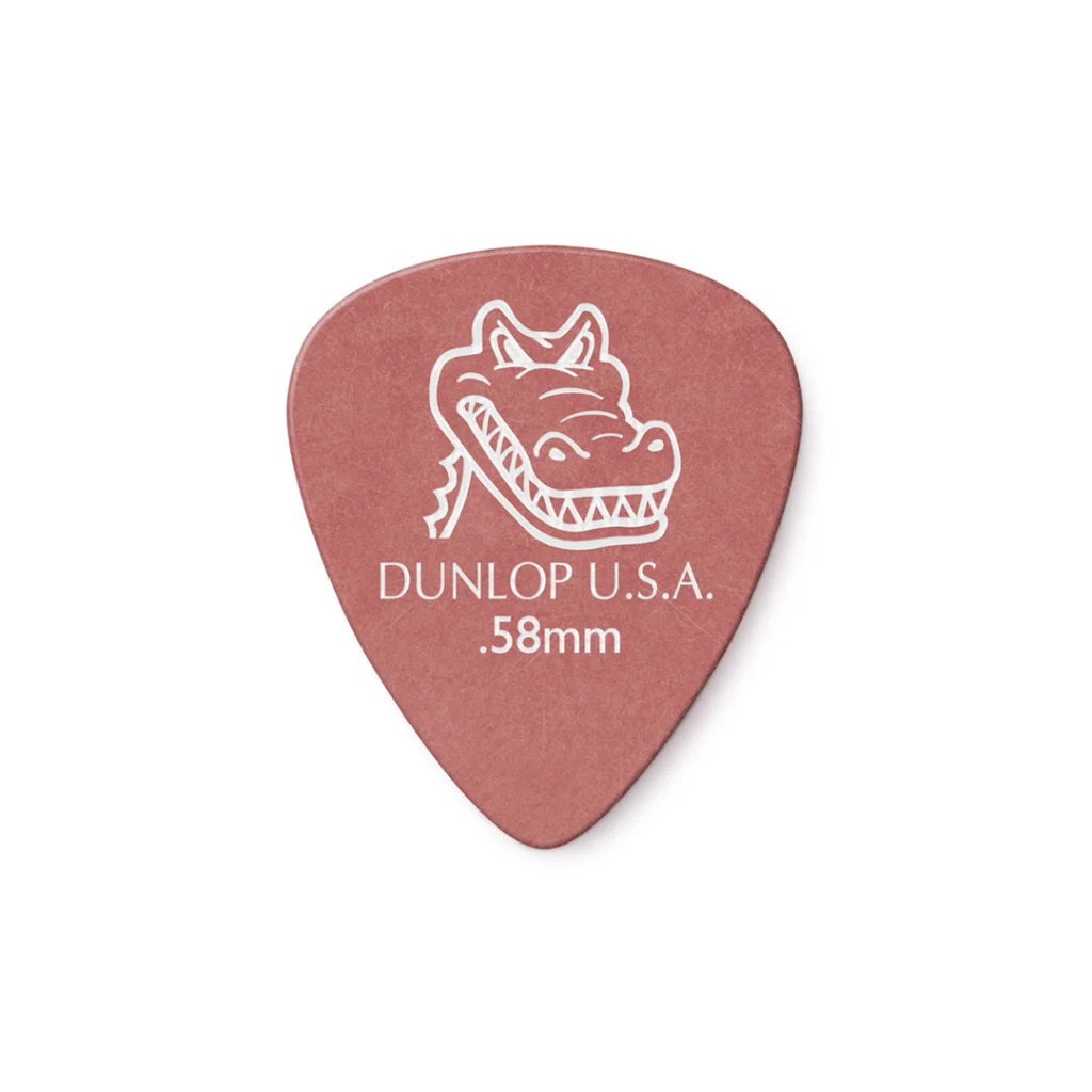Vista frontal de plumilla Jim Dunlop Gator Grip roja. Muestra superficie mate