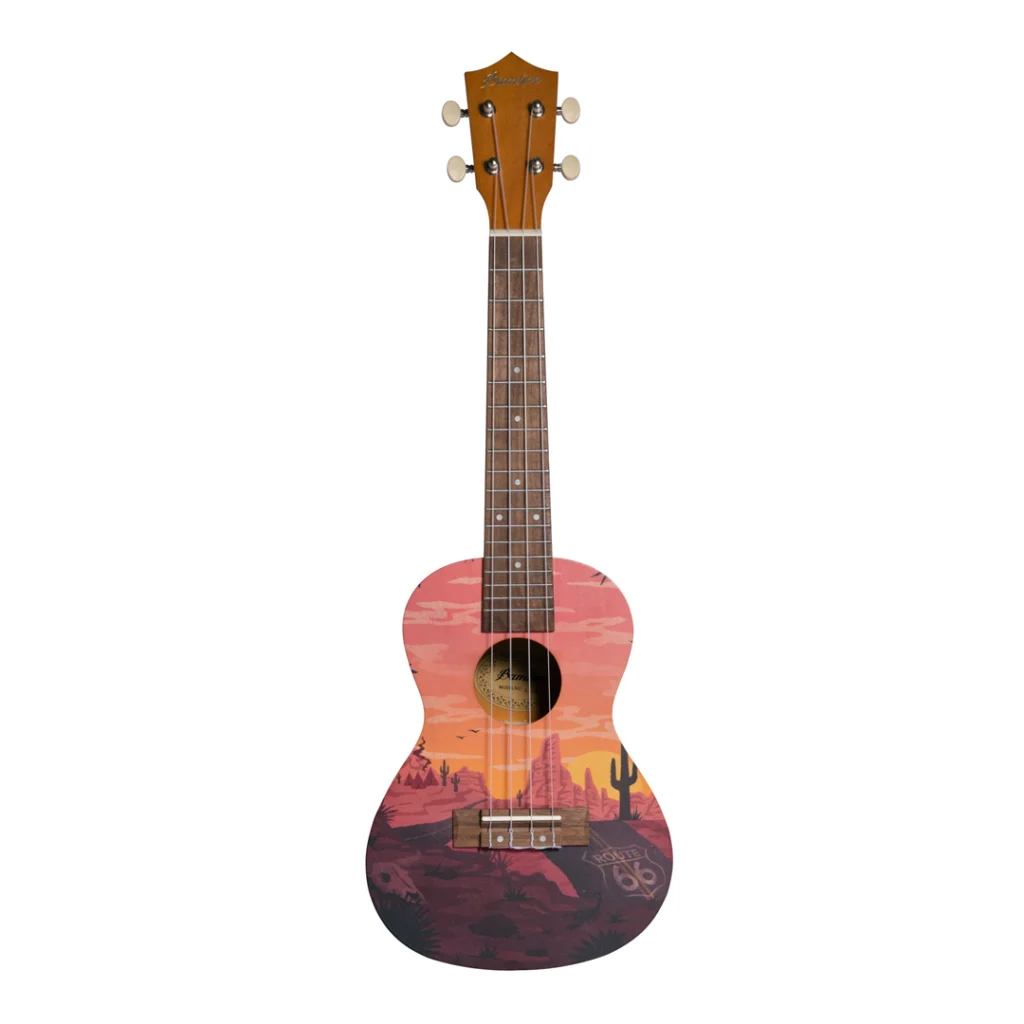 Vista frontal de ukelele Bamboo Culture Line Sunset. Cuerpo con ilustración temática de atardecer en el desierto